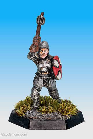 Armoured Female Cleric with Shield striking
