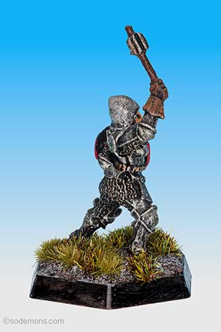 Armoured Female Cleric with Shield striking