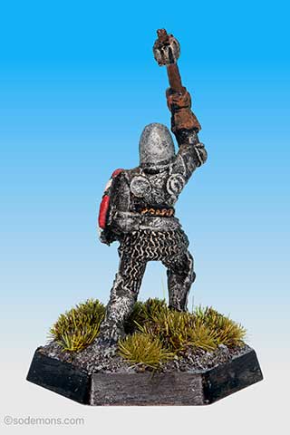 Armoured Female Cleric with Shield striking
