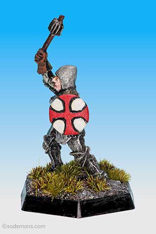Armoured Female Cleric with Shield striking